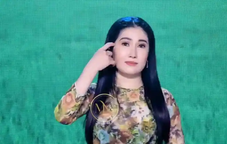 Hình ảnh sân khấu MV "Hương Tình Bến Tre" với bối cảnh quê hương được tái hiện đầy chân thật